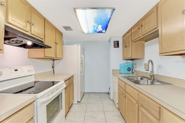 kitchen with white appliances, light brown cabinets, light tile patterned floors, and sink