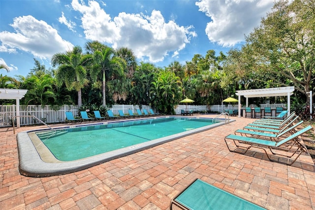 view of swimming pool featuring a patio area