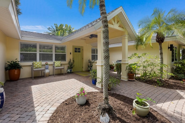 view of patio / terrace featuring ceiling fan