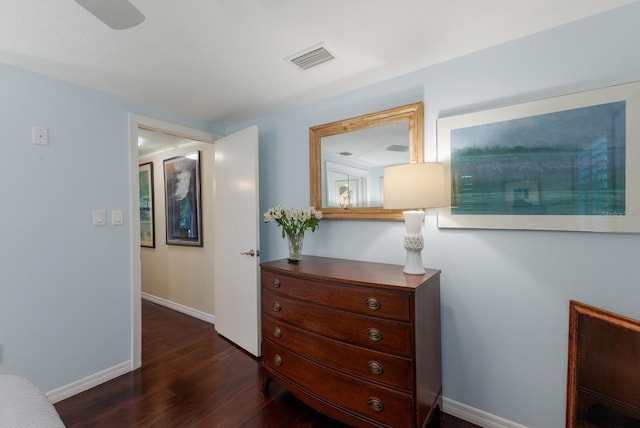 hall with dark wood-type flooring