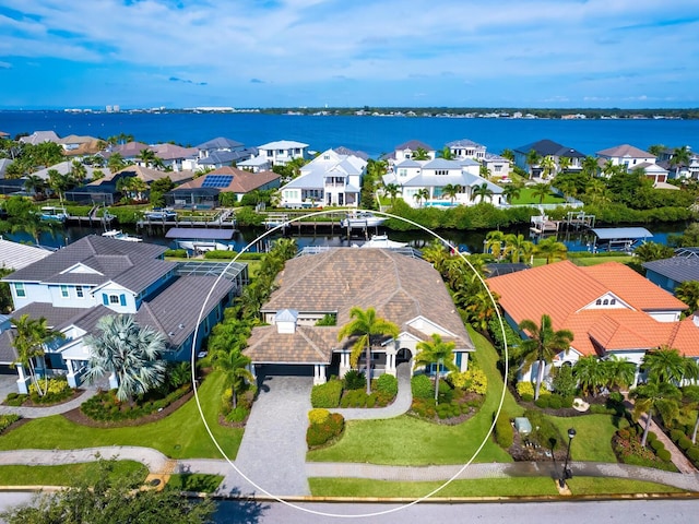 bird's eye view with a water view