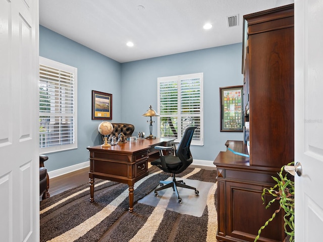 office space featuring hardwood / wood-style flooring and plenty of natural light