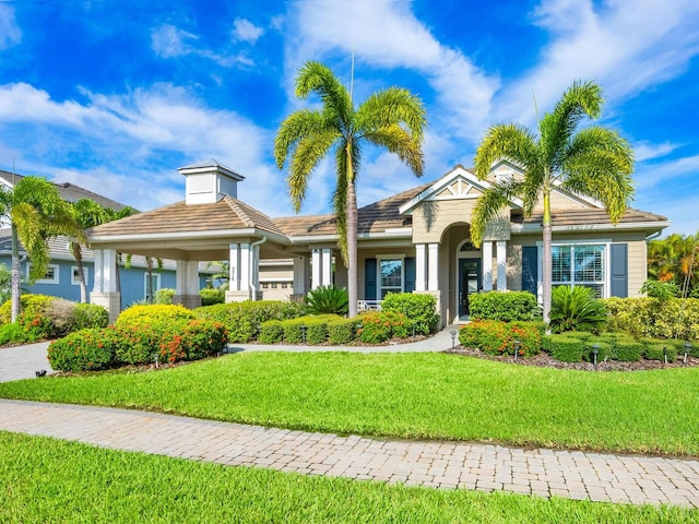 view of front facade with a front yard