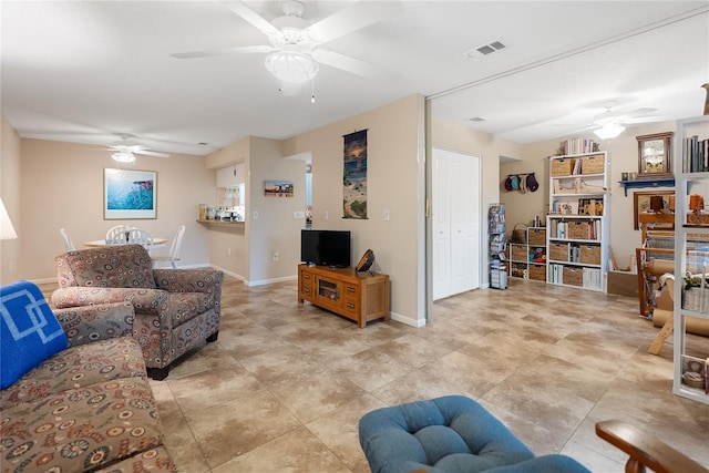 living room with ceiling fan