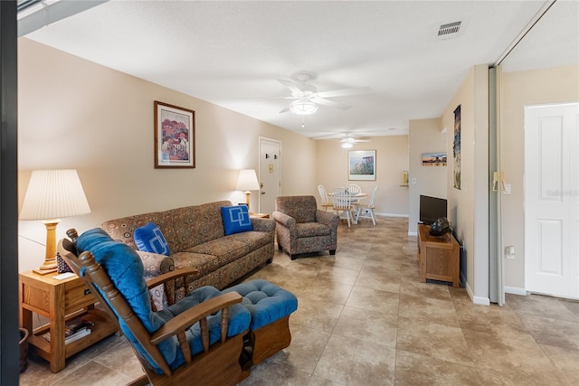 living room with ceiling fan