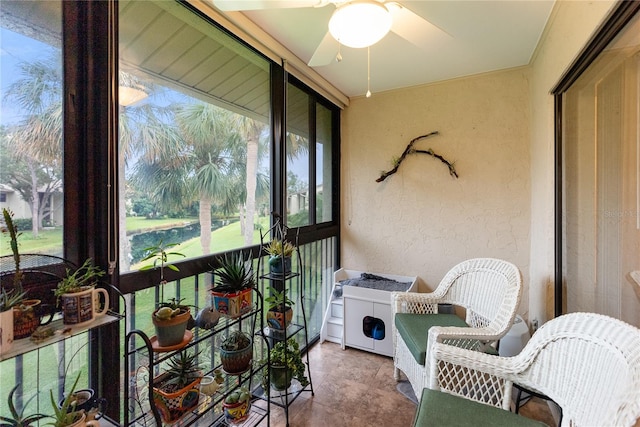 sunroom / solarium with ceiling fan