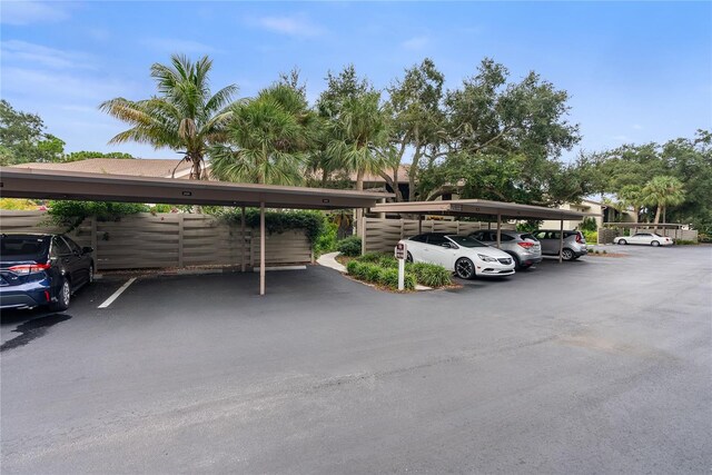 view of vehicle parking featuring a carport