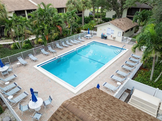 view of swimming pool with a patio area