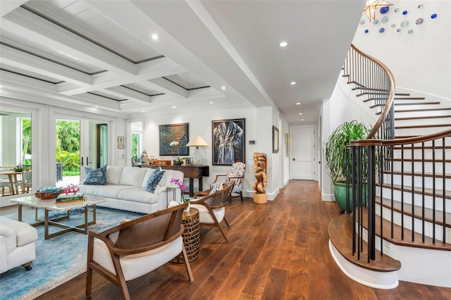 living room featuring ornamental molding, beam ceiling, coffered ceiling, and dark hardwood / wood-style floors