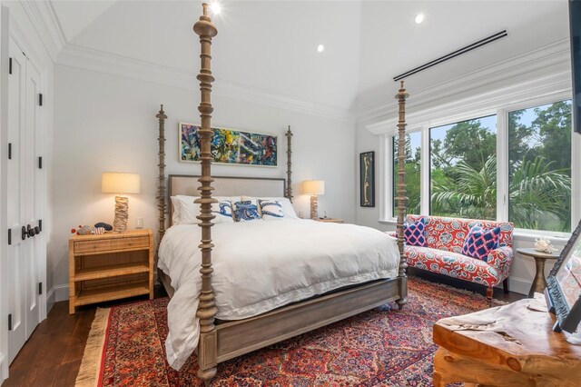 501 Harbor Point Rd, Longboat Key, FL 34228 - bedroom with lofted ceiling, wood finished floors, crown molding, baseboards, and recessed lighting