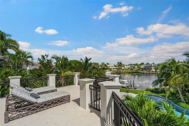 view of patio featuring a water view