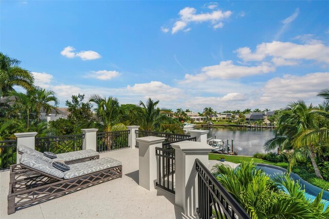 501 Harbor Point Rd, Longboat Key, FL 34228 - view of patio / terrace with a water view and a balcony