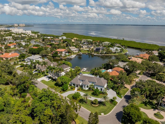 drone / aerial view with a water view