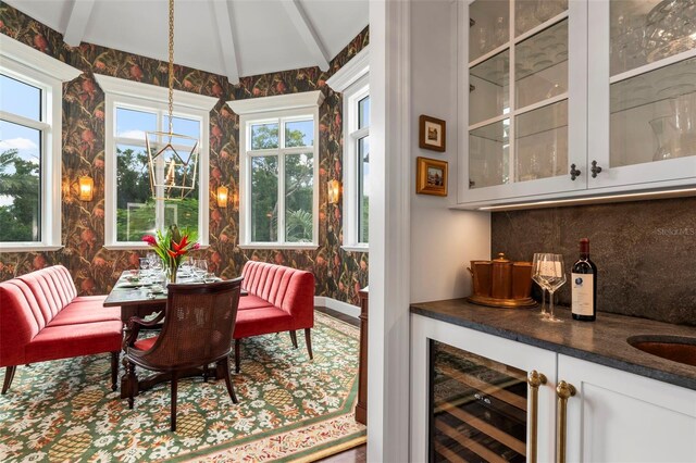 501 Harbor Point Rd, Longboat Key, FL 34228 - sunroom featuring wine cooler