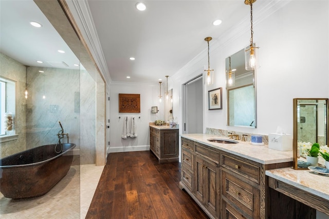 bathroom featuring wood-type flooring, vanity, plus walk in shower, and ornamental molding