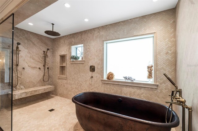 501 Harbor Point Rd, Longboat Key, FL 34228 - full bathroom featuring a walk in shower, a freestanding bath, and recessed lighting
