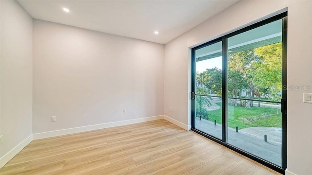 doorway with light wood-type flooring