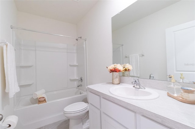 full bathroom with vanity, toilet, and  shower combination