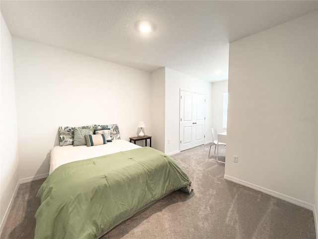 bedroom featuring carpet