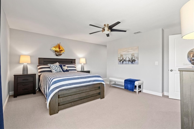 bedroom featuring carpet floors, baseboards, visible vents, and ceiling fan