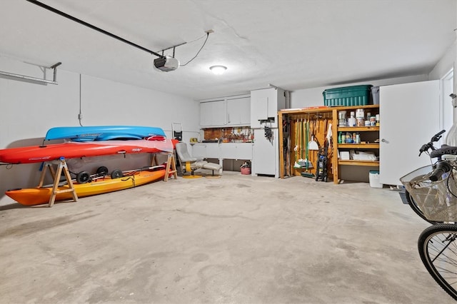 garage featuring a garage door opener