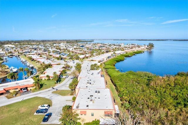 aerial view with a water view and a residential view