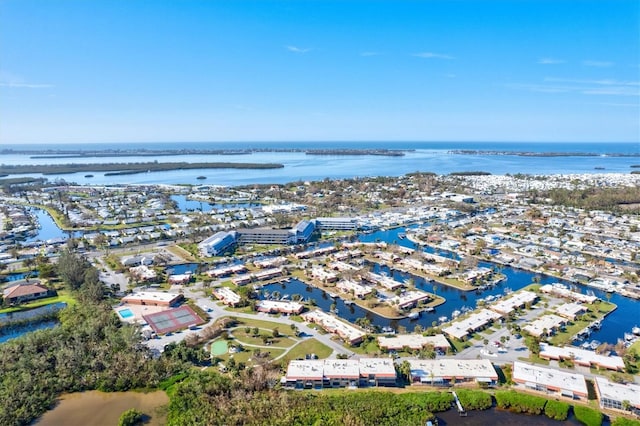 bird's eye view with a water view