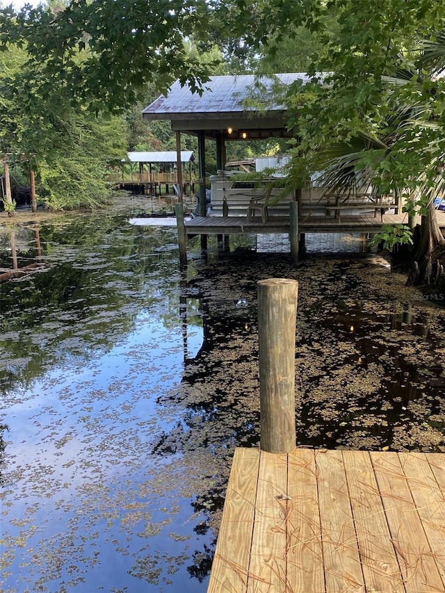 view of dock featuring a water view