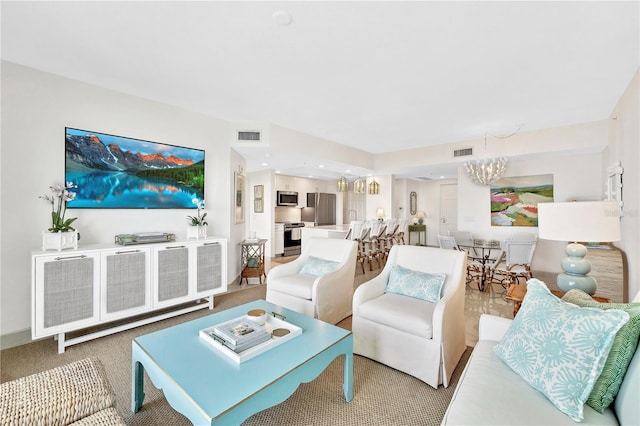 living room featuring a chandelier