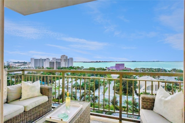 balcony featuring a water view