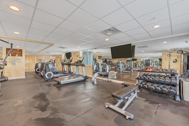 gym featuring a paneled ceiling