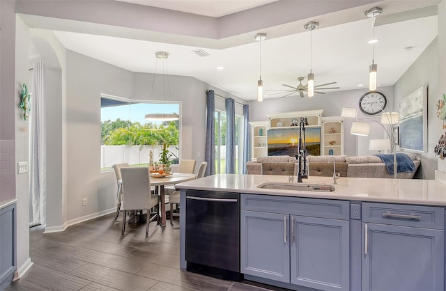 kitchen featuring dark hardwood / wood-style flooring, ceiling fan, sink, decorative light fixtures, and dishwasher