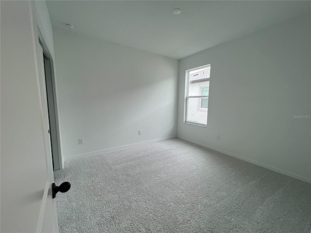 766 Hillshire Pl, Spring Hill, FL 34609 - unfurnished bedroom with carpet floors and baseboards