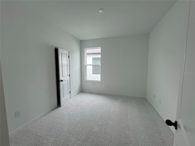 766 Hillshire Pl, Spring Hill, FL 34609 - carpeted empty room with baseboards