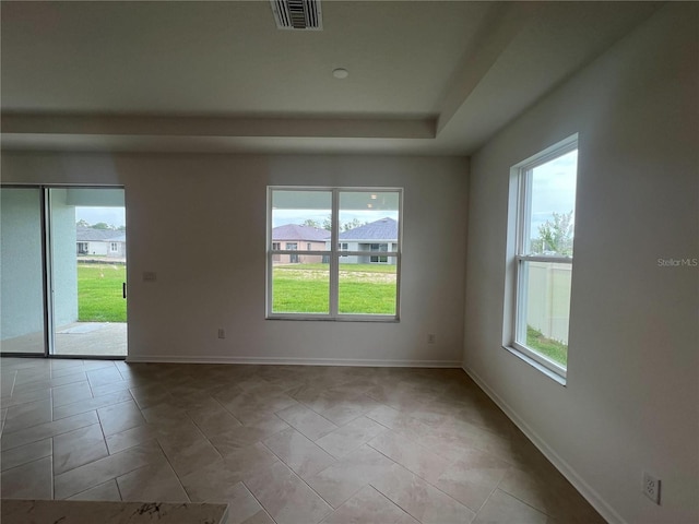 766 Hillshire Pl, Spring Hill, FL 34609 - unfurnished room featuring a raised ceiling and baseboards
