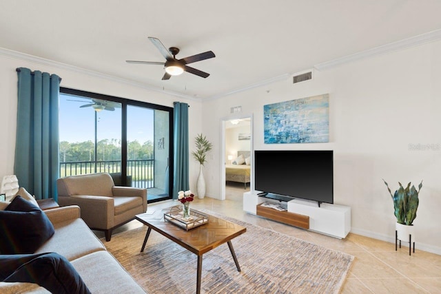 living room featuring ceiling fan, light tile patterned flooring, and ornamental molding