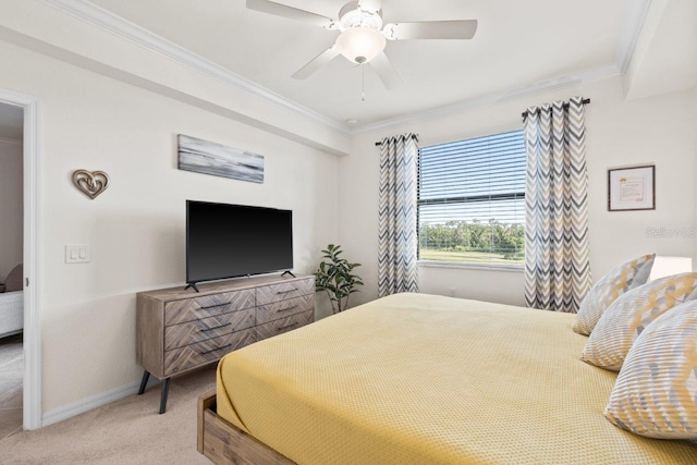 bedroom featuring ornamental molding, carpet flooring, and ceiling fan