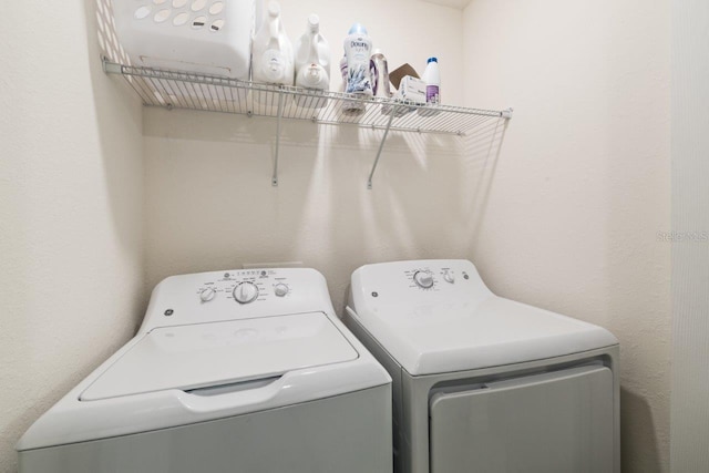 laundry room with washer and dryer