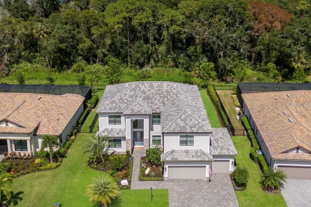 16215 Tradewind Ter, Lakewood Ranch, FL 34211 - aerial view of property and surrounding area featuring a forest