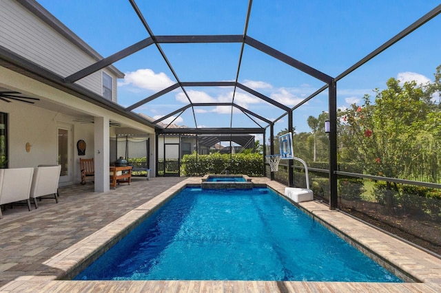 16215 Tradewind Ter, Lakewood Ranch, FL 34211 - view of pool featuring a patio area, ceiling fan, a pool with connected hot tub, and glass enclosure