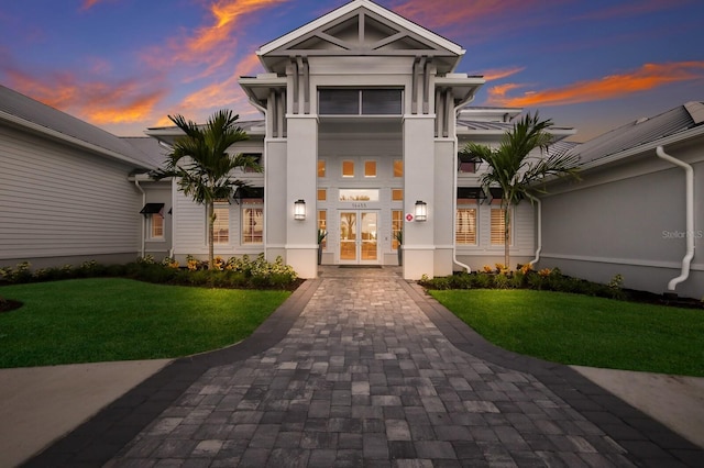 16215 Tradewind Ter, Lakewood Ranch, FL 34211 - view of front of house with a yard and french doors