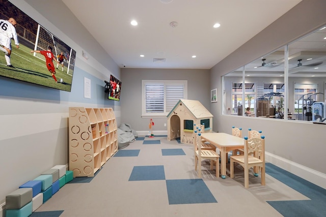 game room featuring a wealth of natural light