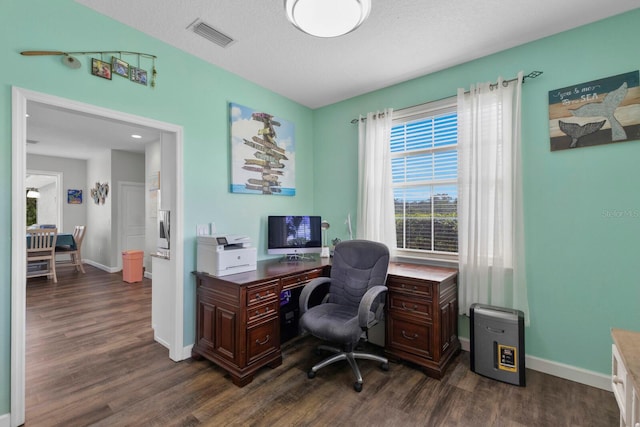 office area featuring a textured ceiling and dark hardwood / wood-style flooring