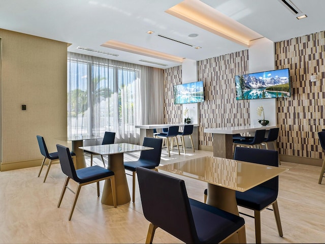 dining room featuring floor to ceiling windows