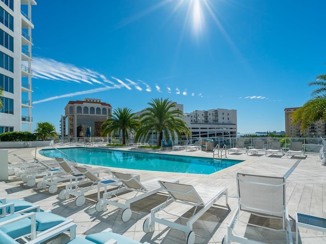 view of swimming pool with a patio