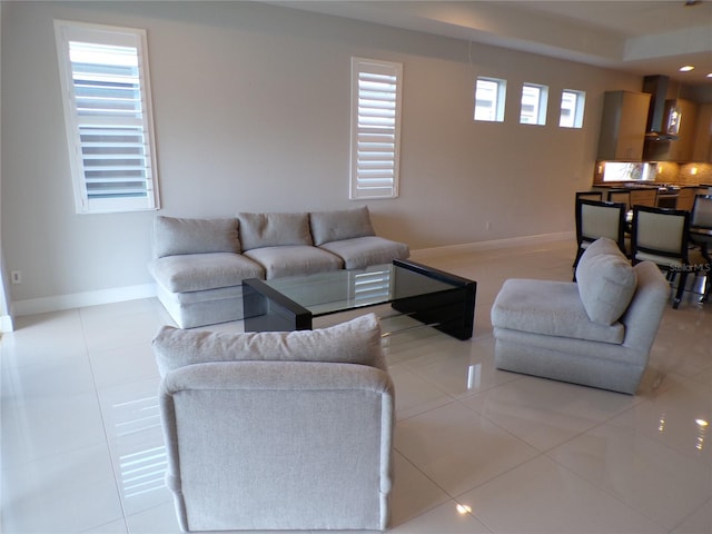 living room featuring light tile patterned floors