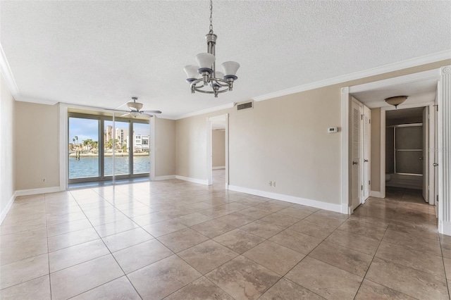 tiled spare room with ornamental molding, a textured ceiling, and a water view