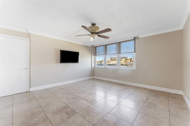 tiled empty room with crown molding, a textured ceiling, and ceiling fan