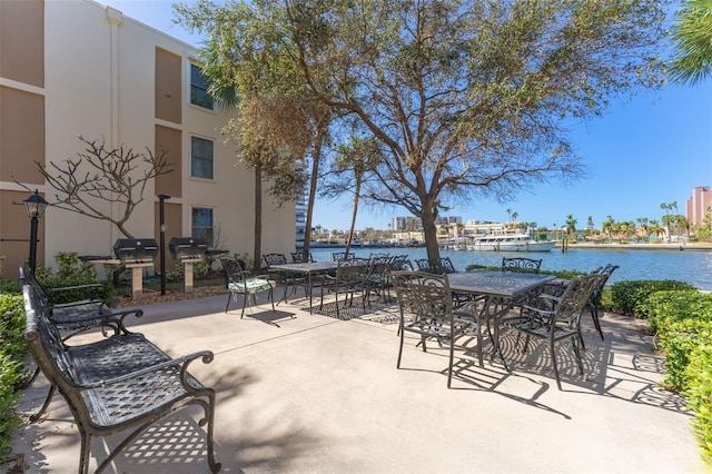 view of patio / terrace with a water view