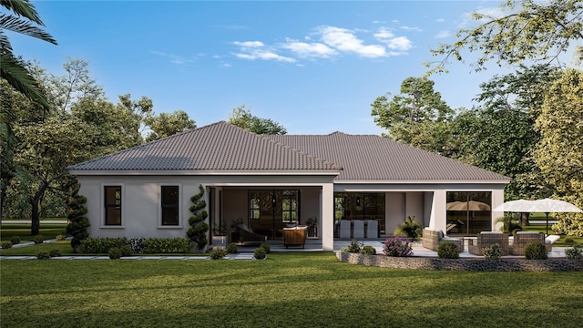 rear view of house with a lawn